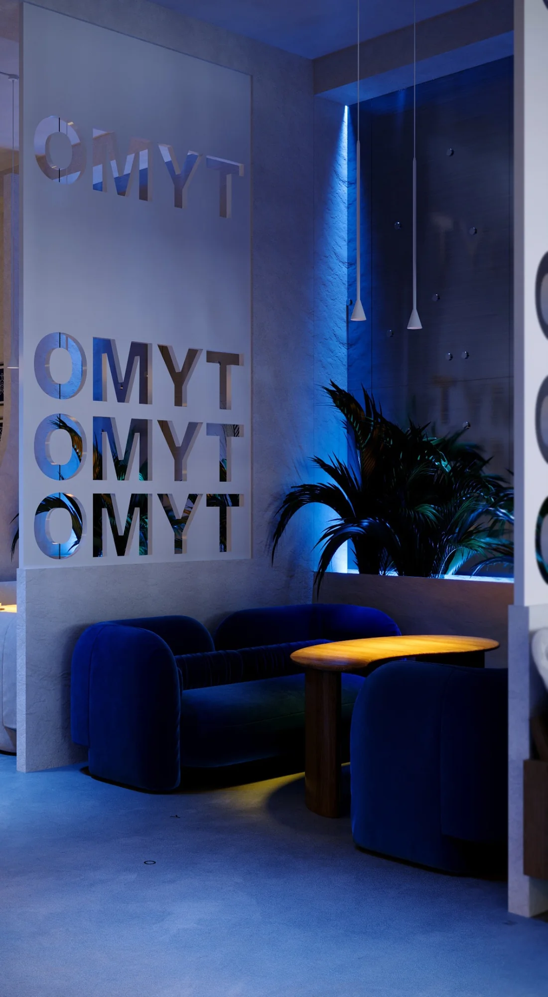Синий диван и зеркальные буквы OMYT